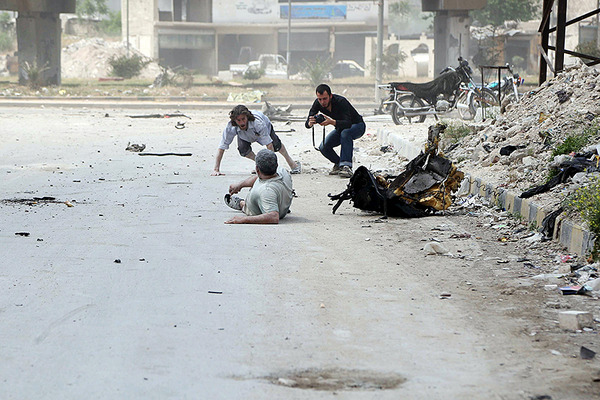 Reporters on Syria's war: why they do it, what they risk