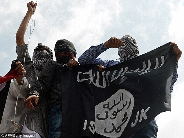 Horrifying: ISIS militants rounded up the 13 teenage boys, whose only crime was watching football on television, and executed then by firing squad in Mosul, and Iraqi city under ISIS control (stock image)