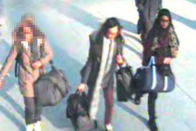 A handout photograph showing three schoolgirls at Gatwick Airport in London who are believed to be making their way to Syria to join ISIL. London Metropolitan Police Photo