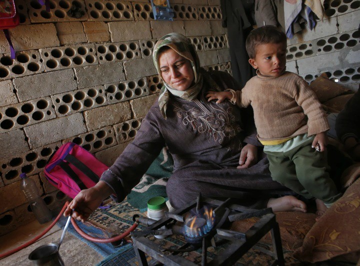 A Syrian refugee with her child. (NB: This is not the woman to whom this story refers.