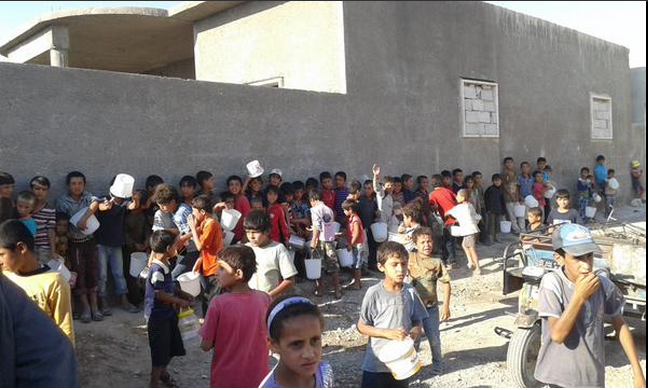 Civilians living under ISIS rule in their headquarters in Raqqa fear Syrian Kurdish fighters as well as the Islamic militants. Above, children in the city, June 24, 2015. Raqqa is Being Slaughtered Silently