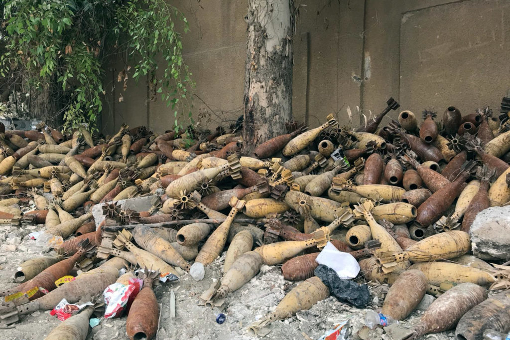 Mortar shells are piled up in the back of a school playground in Raqqa, Syria. Ruth Sherlock/NPR
