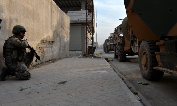 Turkish soldiers in Tal Abyad. President Erdoğan has agreed a five-day ceasefire with US vice-president Mike Pence. Photograph: Turkish Defence MinistryHandout/EPA