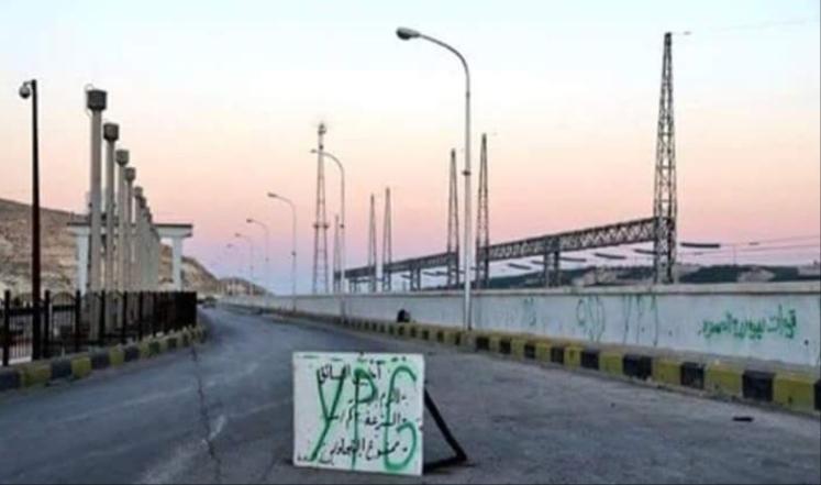ISIS warns the people in the villages for fear of the rising water levels of the Euphrates River